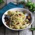 Tagliatelle in Venusmuschel-Weißweinsauce mit getrockneten Tomaten und Artischocken