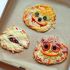 Noch eine Idee für kleine Monster: Mini Monster- und Mumienpizzen