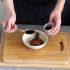 Die Nutella mit dem Espresso vermischen, sodass eine cremige Masse entsteht.